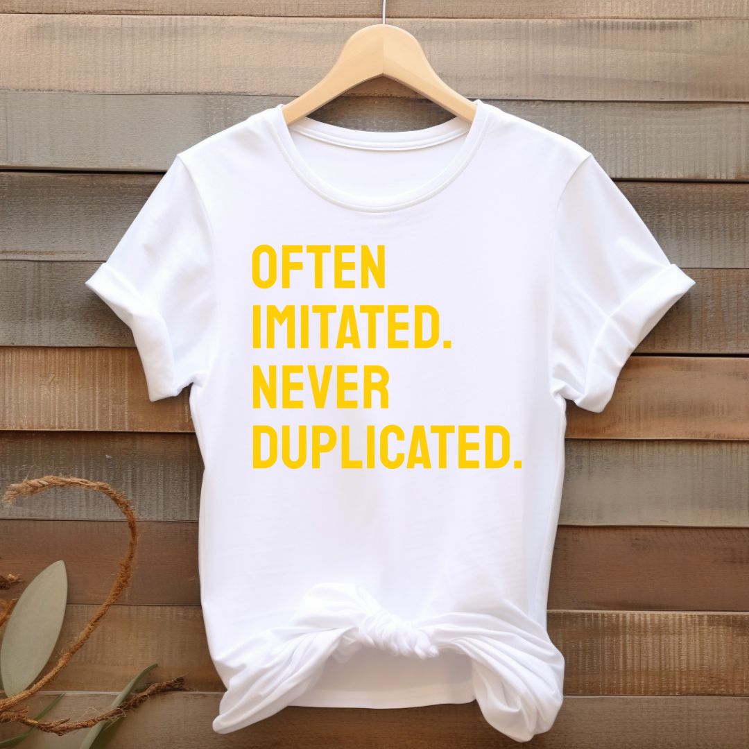 Often Imitated, Never Duplicated T-Shirt (Yellow Print)